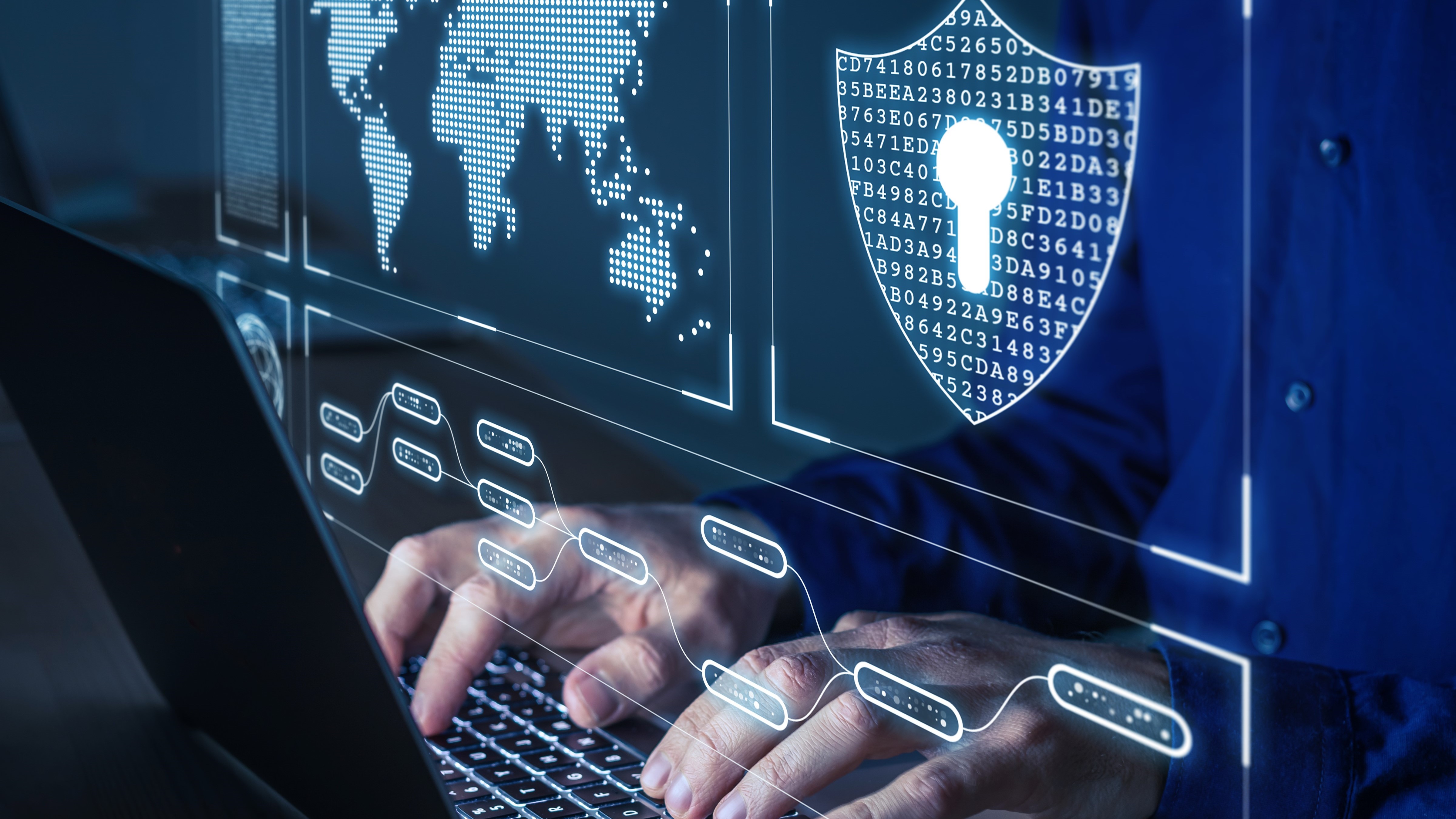 a man typing on the computer