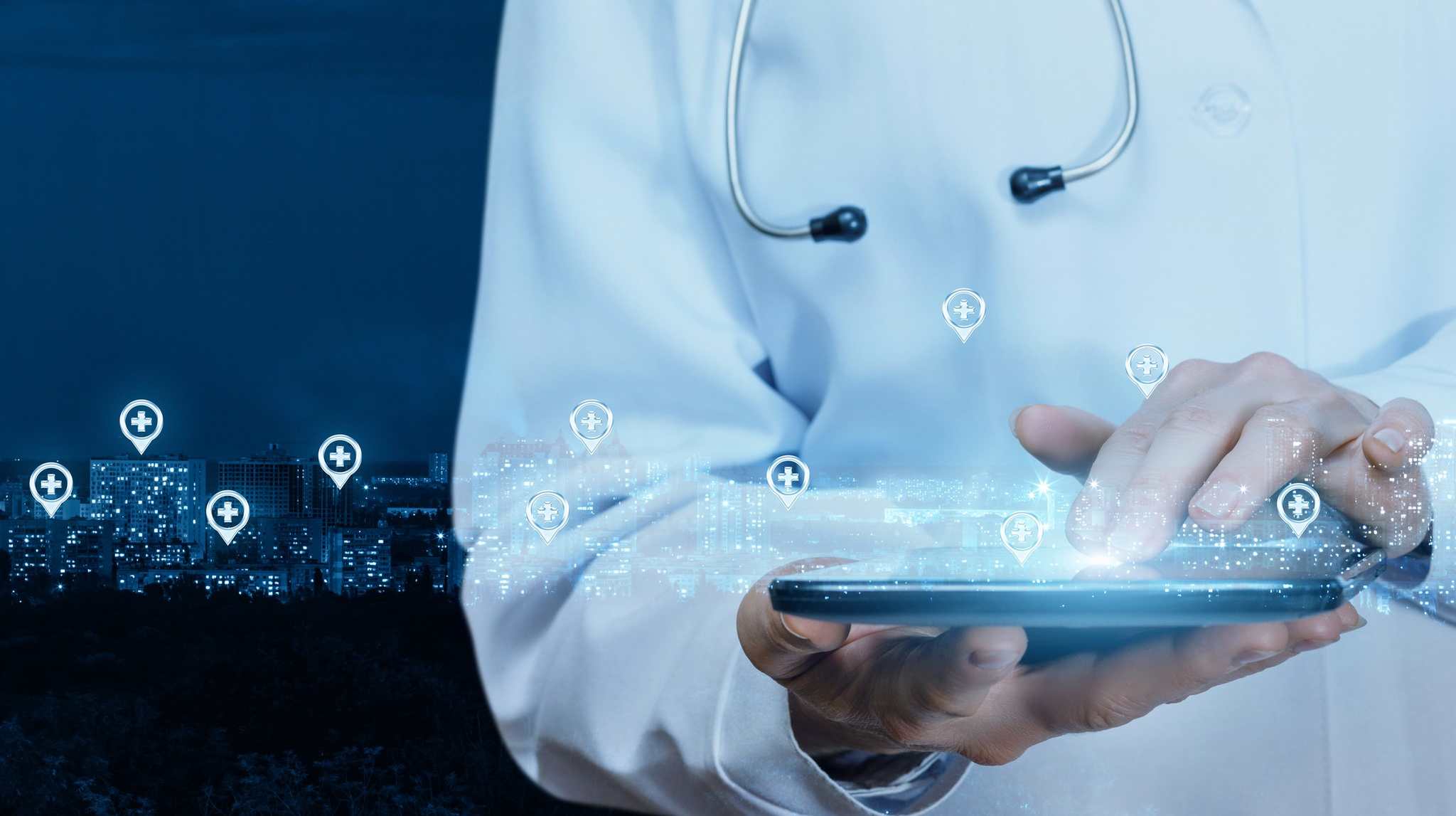 A doctor holding a tablet with digital icons