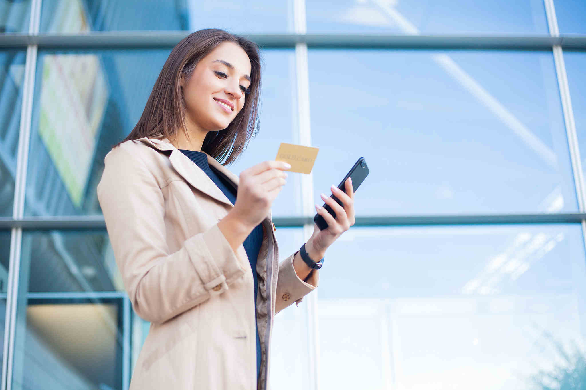 women looking at a credit card