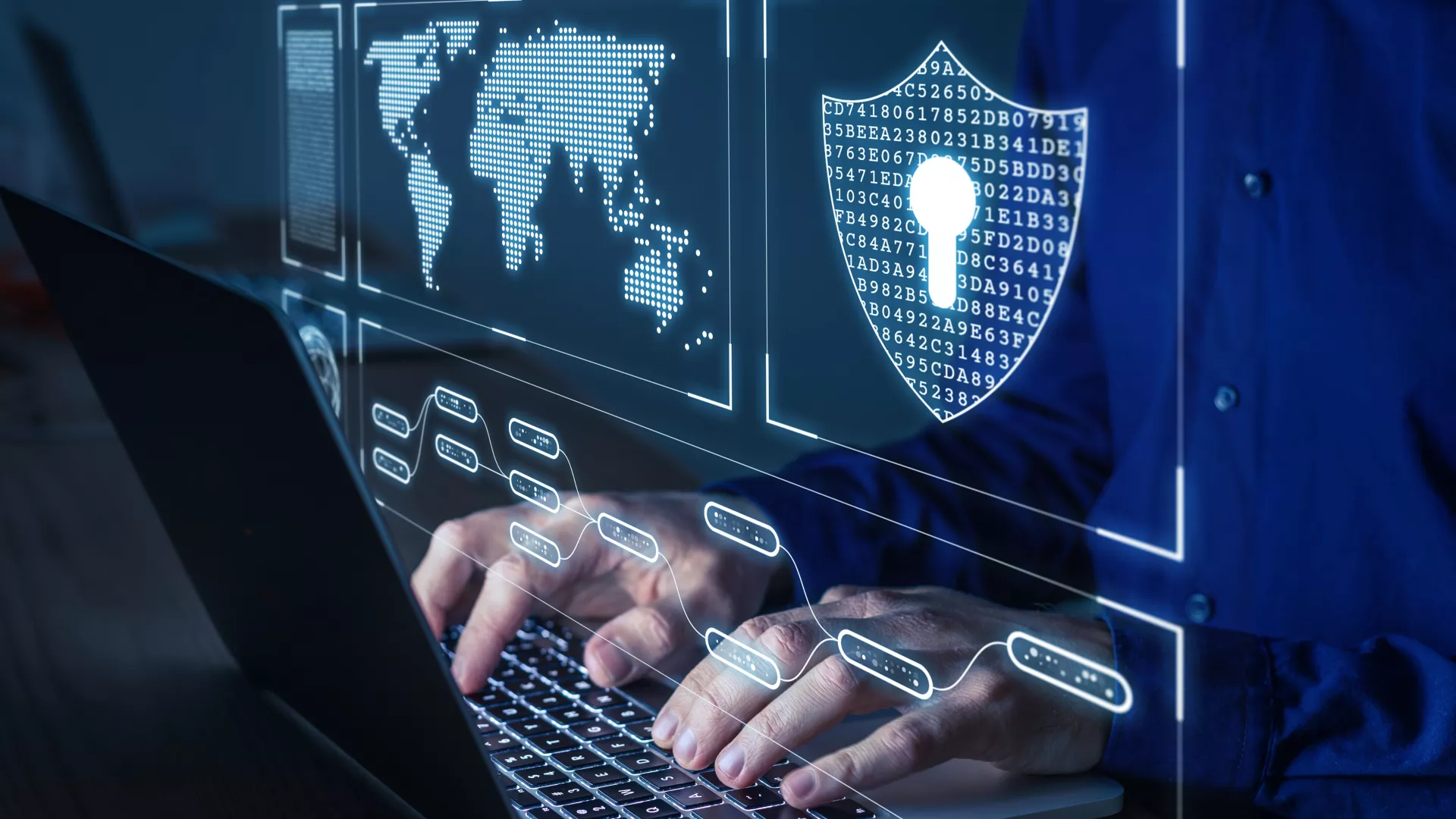 a man typing on the computer