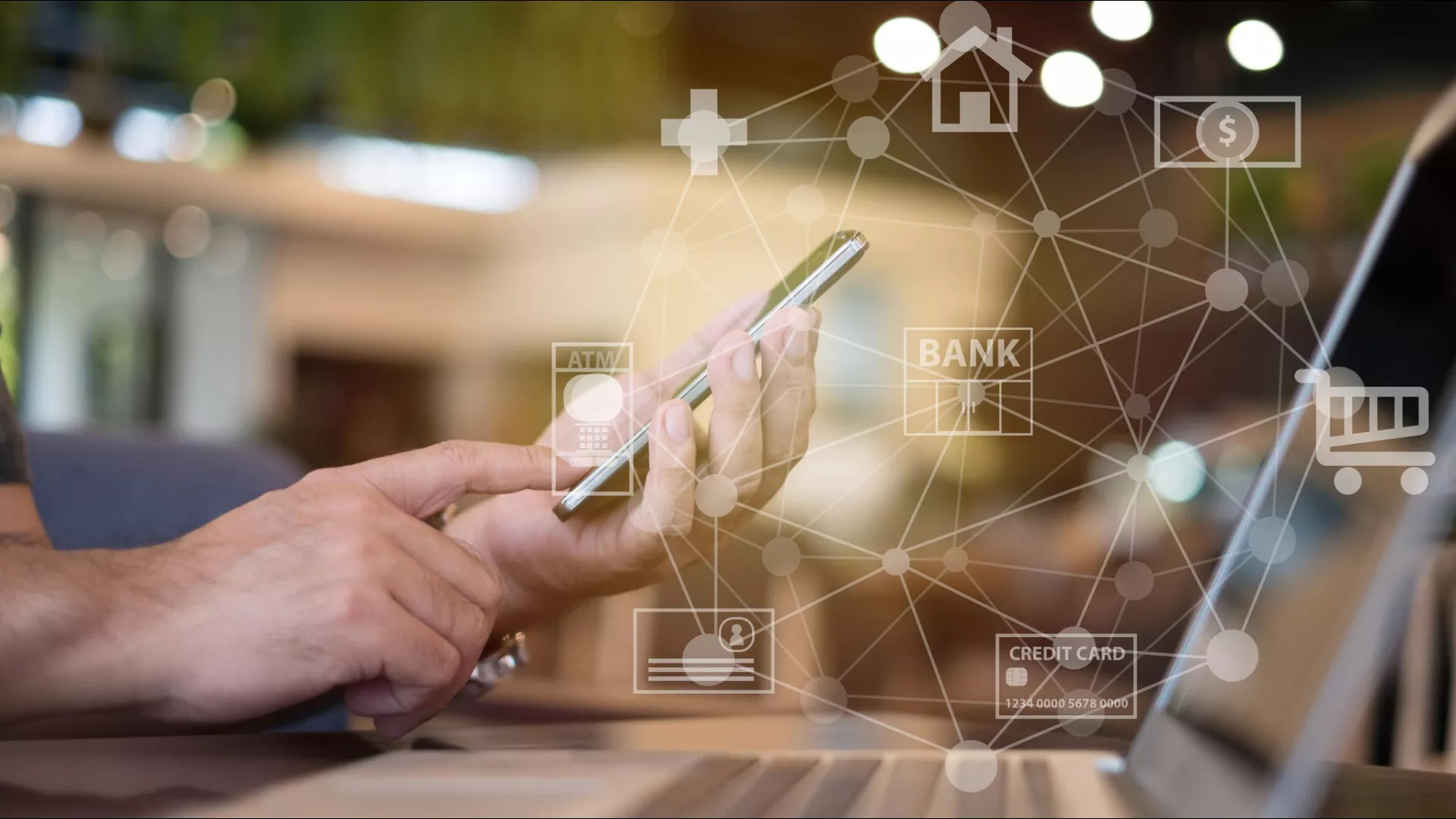 laptop with bank and atm icons